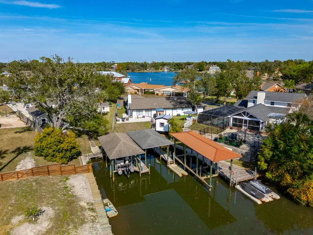 a front view of house with yard and entertaining space