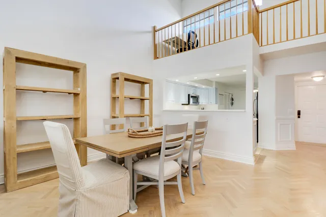 a kitchen with a sink cabinets and appliances