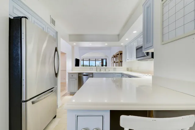 a bed room with a bed and a window