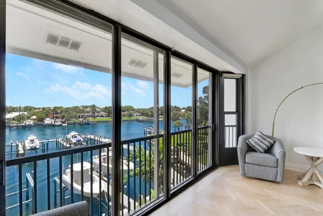 an aerial view of a house with swimming pool