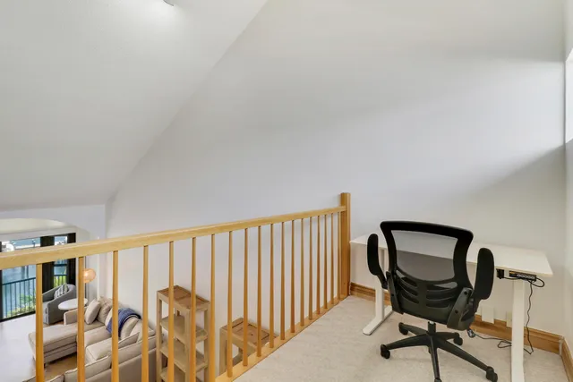 a kitchen with a sink cabinets stainless steel appliances and a window
