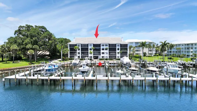 an aerial view of a city with ocean view