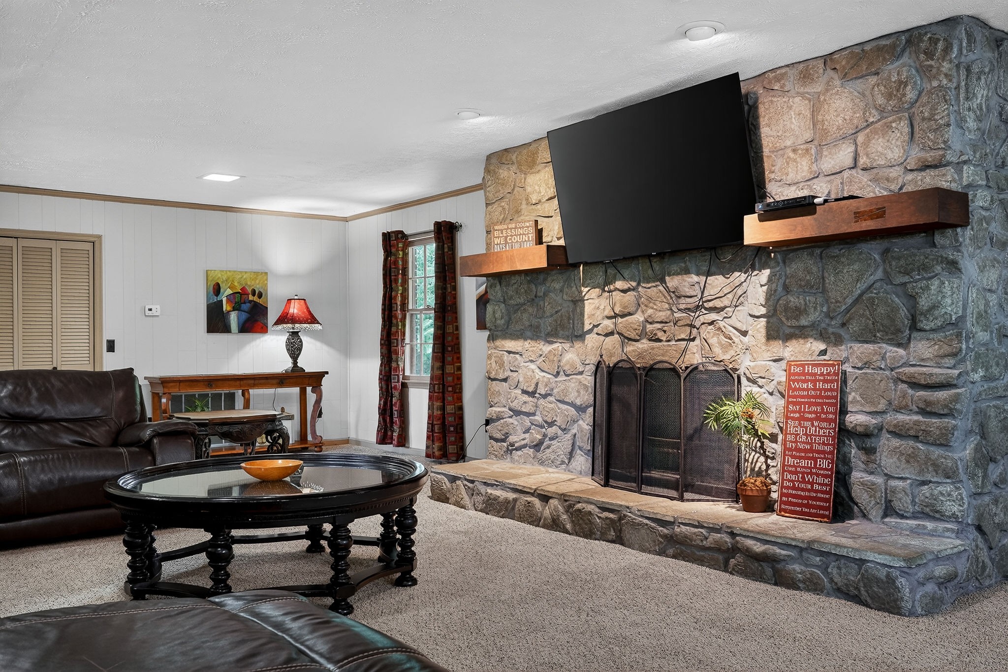5642 Pates Ford Road Smithville, TN 37166 - Photo 5 of 32 a living room with furniture and a fireplace