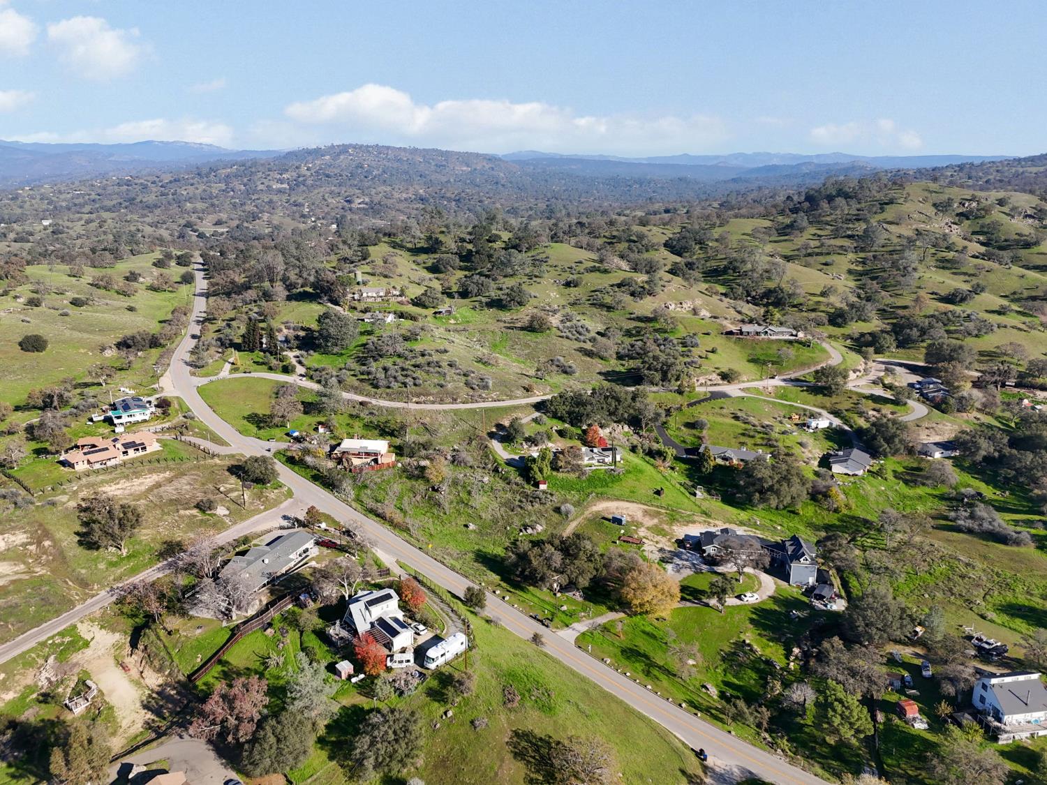 1 Mountain Ranch Way Madera, CA 93636 - Photo 2 of 17 an aerial view of residential houses with outdoor space