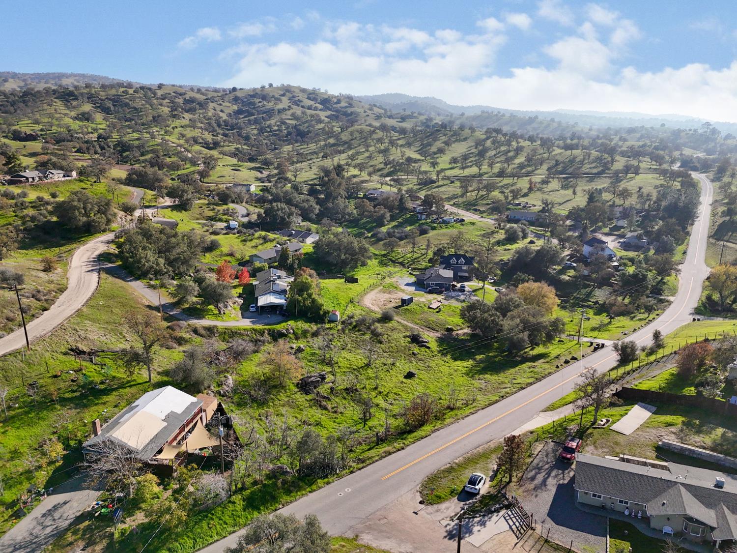 1 Mountain Ranch Way Madera, CA 93636 - Photo 7 of 17 an aerial view of residential houses with outdoor space and street view
