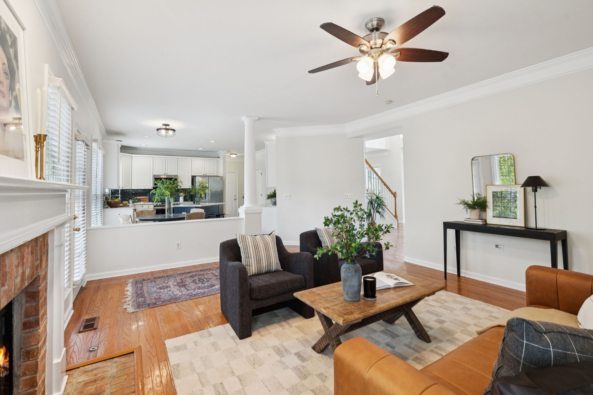 333 Springhouse Circle Franklin, TN 37067 - Photo 12 of 67 a living room with furniture and a fireplace