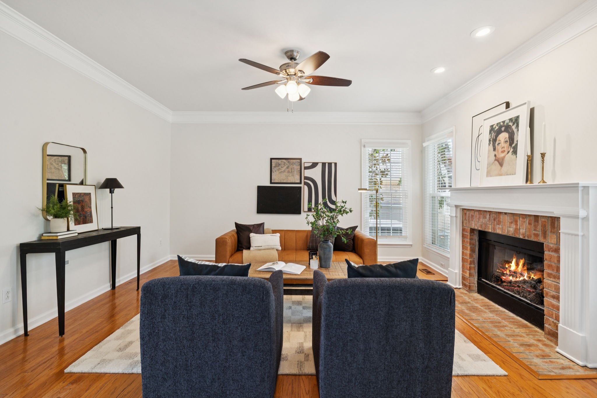333 Springhouse Circle Franklin, TN 37067 - Photo 15 of 67 a living room with furniture and a fireplace