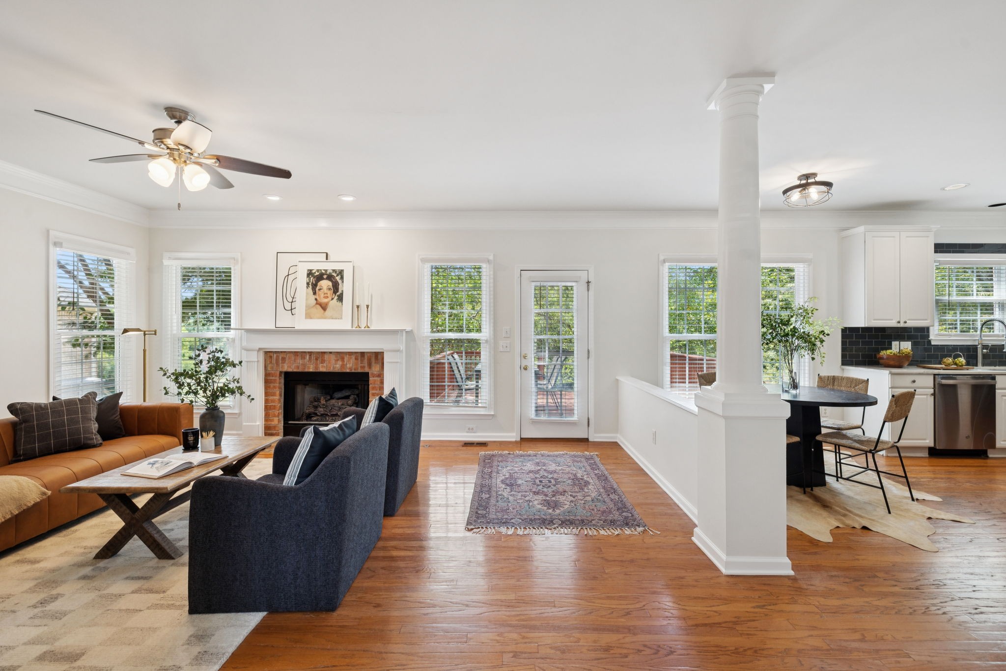 333 Springhouse Circle Franklin, TN 37067 - Photo 16 of 67 a living room with furniture and a fireplace