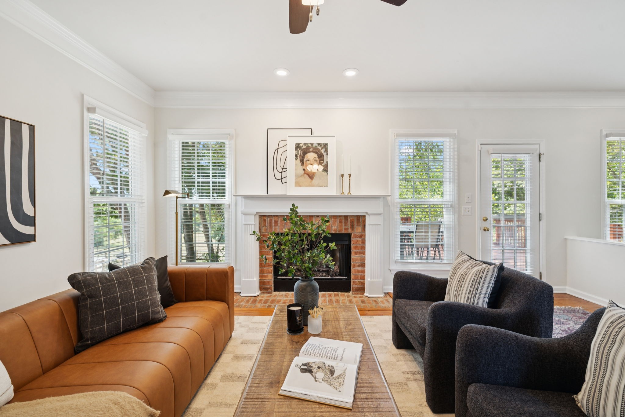 333 Springhouse Circle Franklin, TN 37067 - Photo 20 of 67 a living room with furniture a window and a fireplace