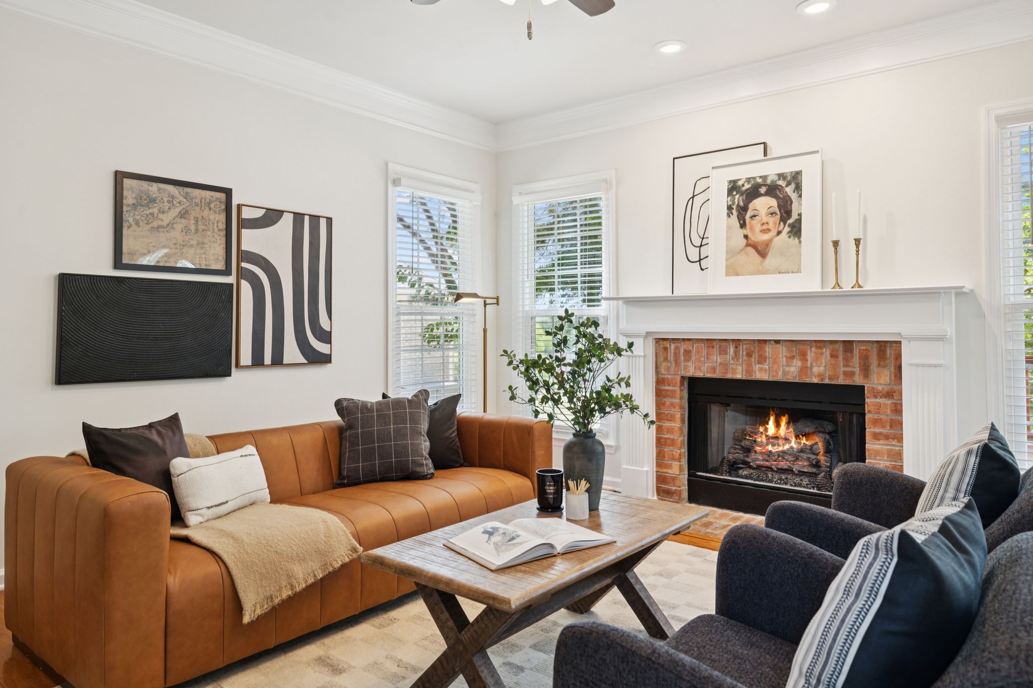 333 Springhouse Circle Franklin, TN 37067 - Photo 27 of 67 a living room with furniture and a fireplace