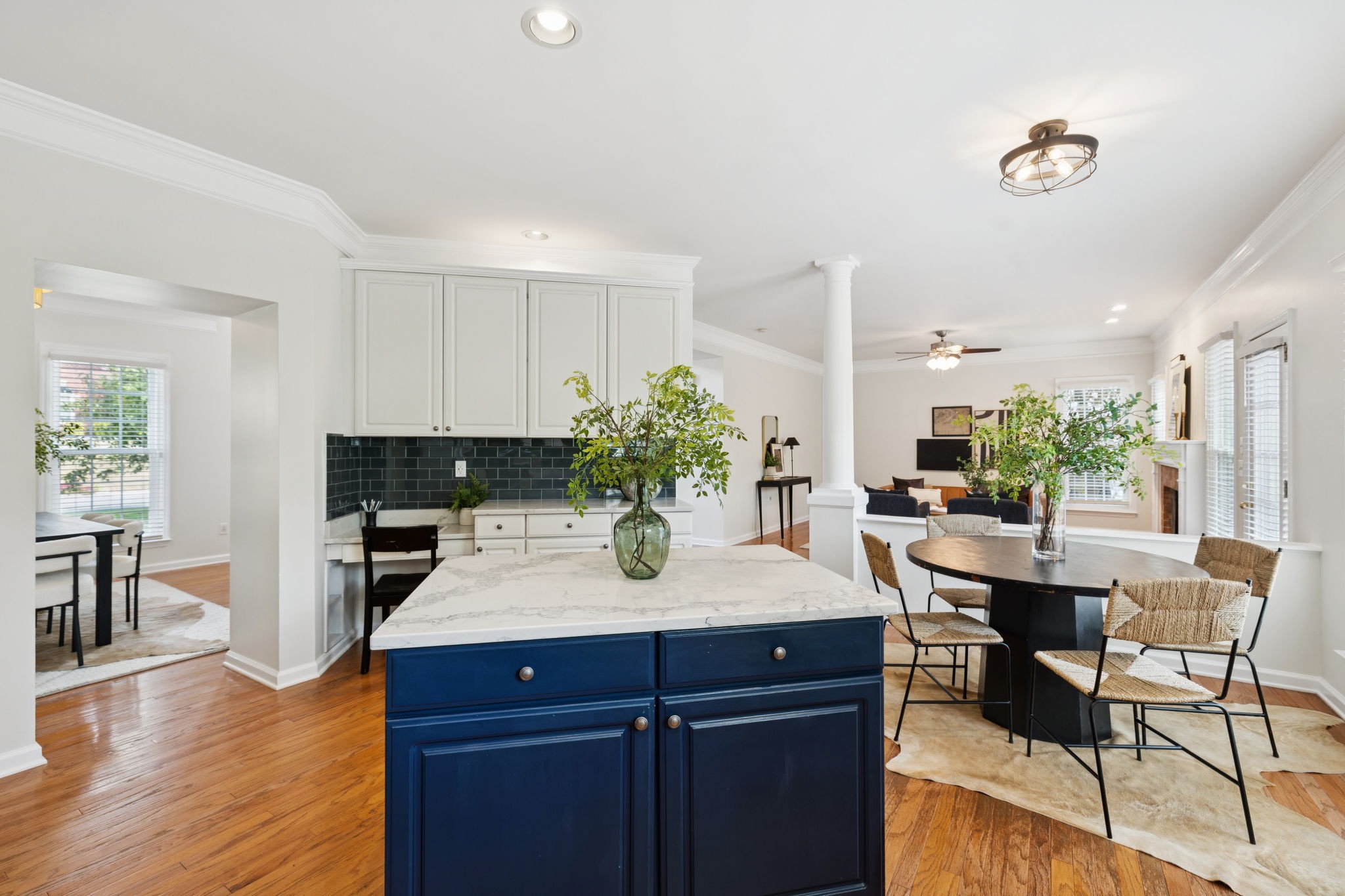 333 Springhouse Circle Franklin, TN 37067 - Photo 33 of 67 a kitchen with a table and chairs in it