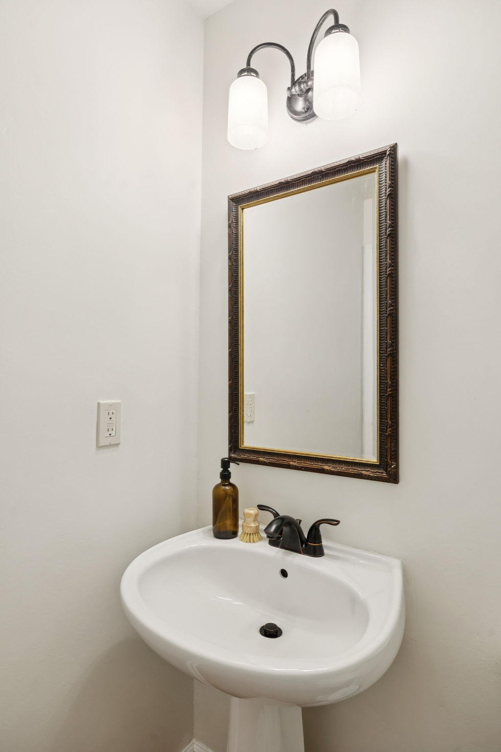 333 Springhouse Circle Franklin, TN 37067 - Photo 40 of 67 a bathroom with a sink and a mirror