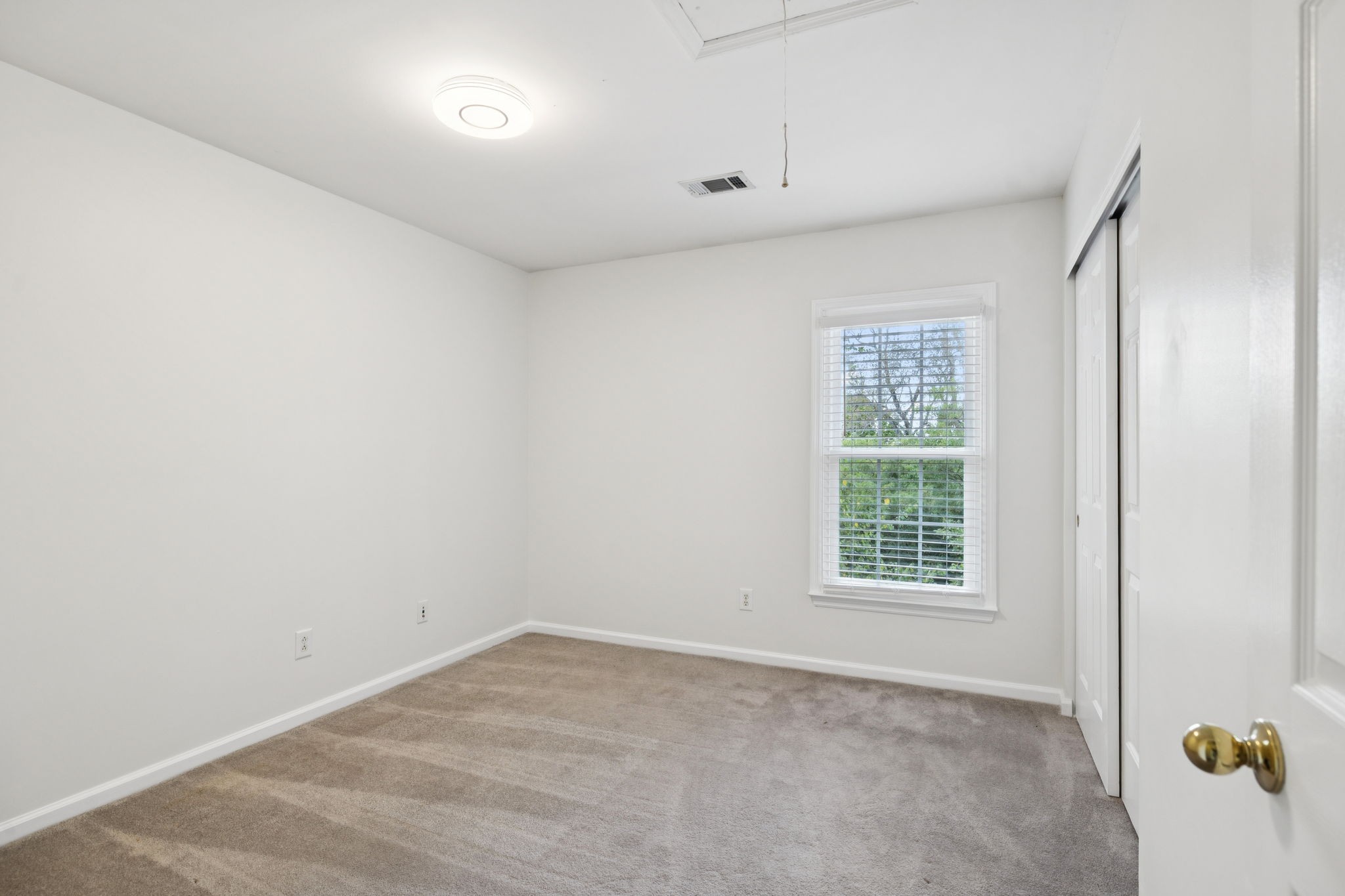333 Springhouse Circle Franklin, TN 37067 - Photo 41 of 67 an empty room with a window