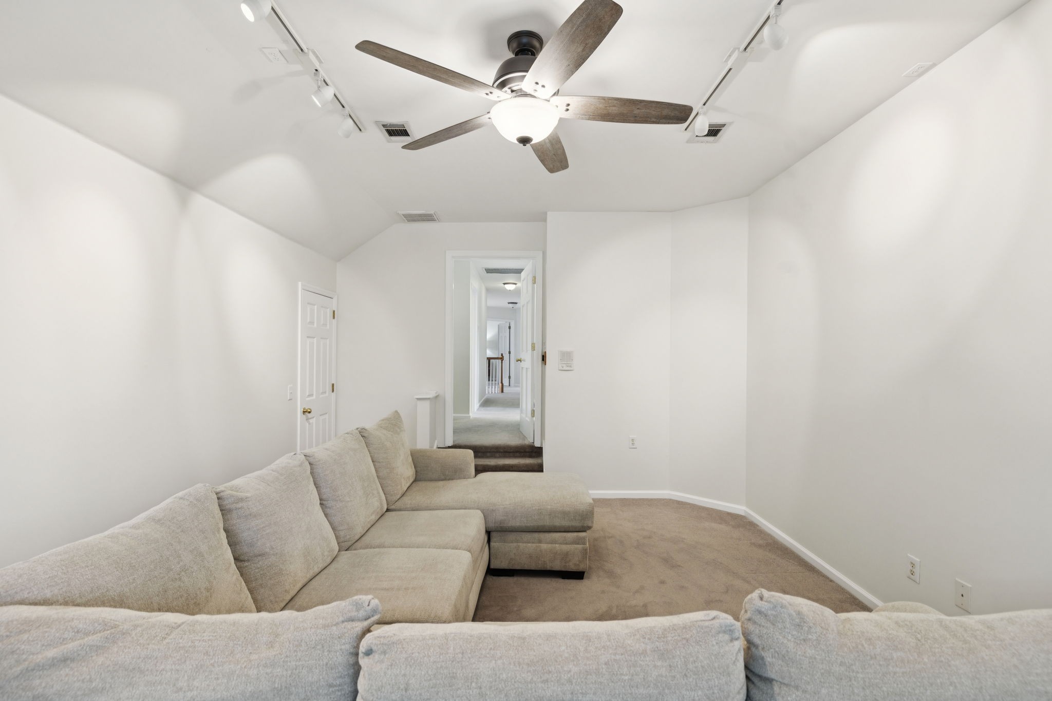333 Springhouse Circle Franklin, TN 37067 - Photo 46 of 67 a living room with furniture and a ceiling fan