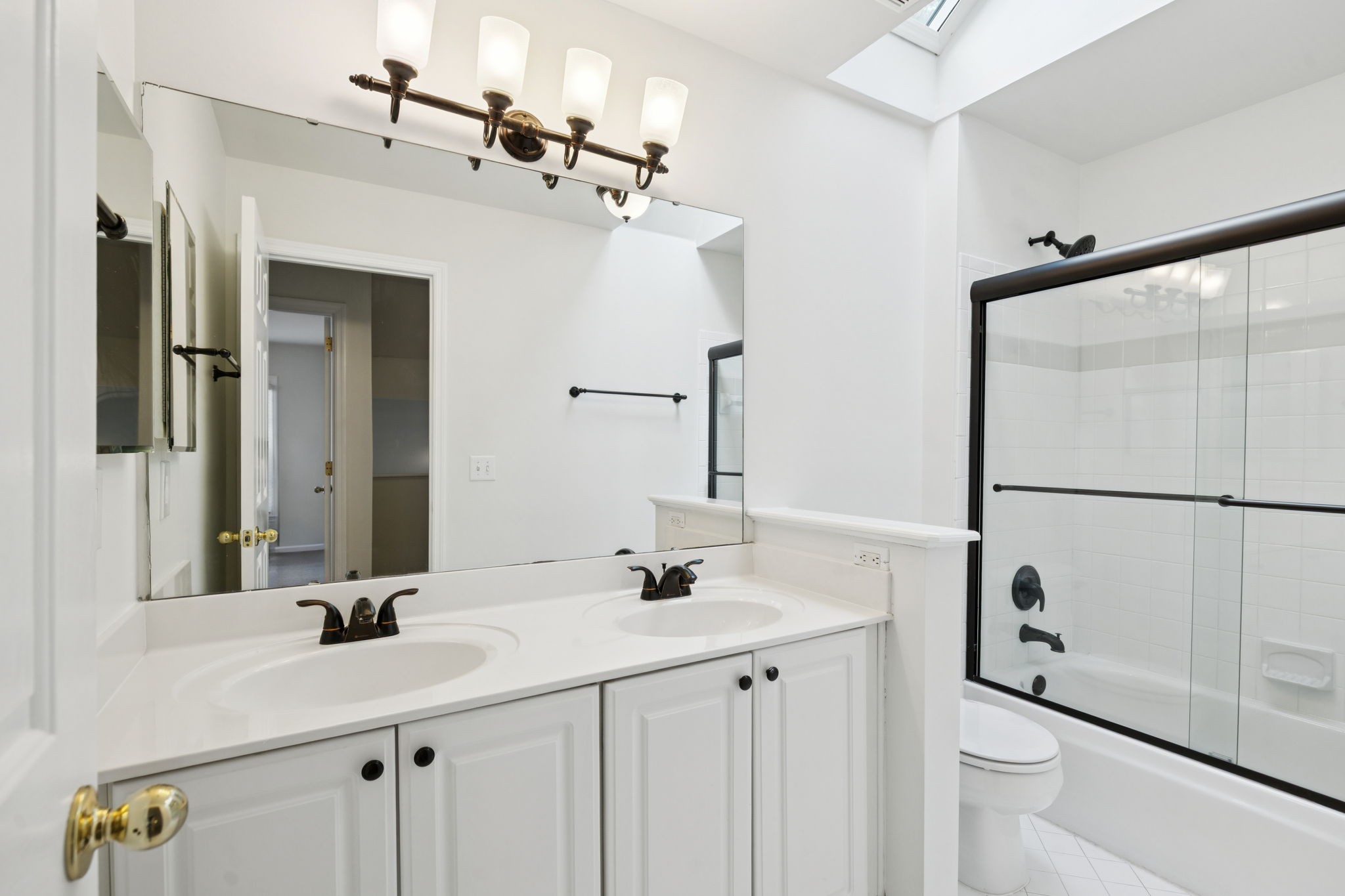 333 Springhouse Circle Franklin, TN 37067 - Photo 48 of 67 a bathroom with a sink and a mirror