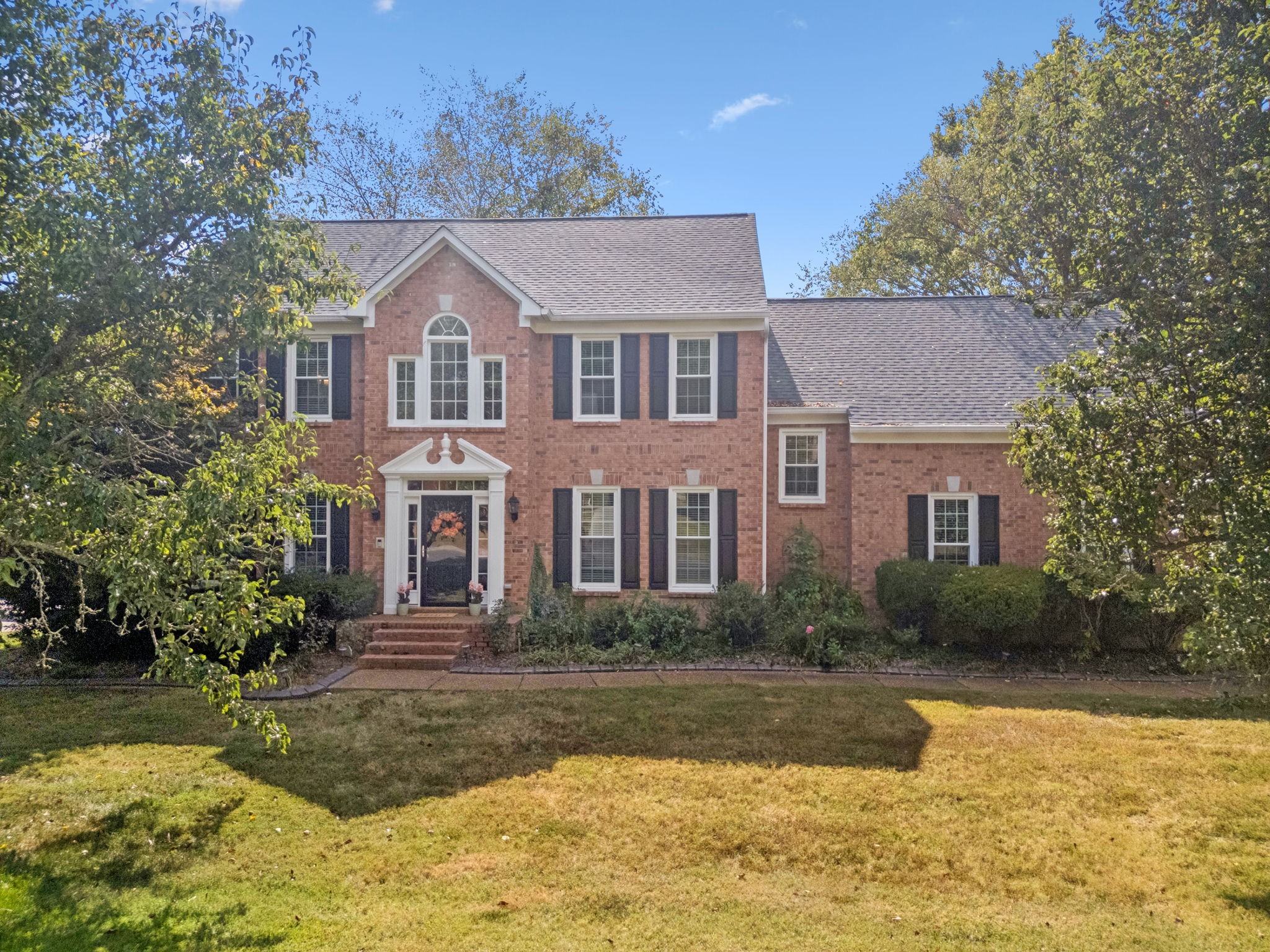 333 Springhouse Circle Franklin, TN 37067 - Photo 58 of 67 a front view of a house with a yard and trees