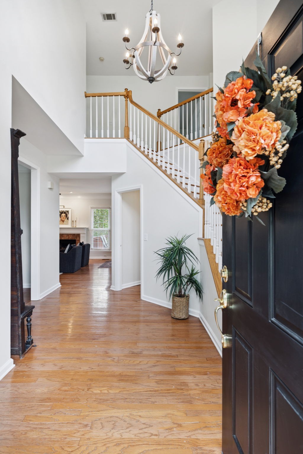 333 Springhouse Circle Franklin, TN 37067 - Photo 6 of 67 a view of entryway livingroom and hall with wooden floor