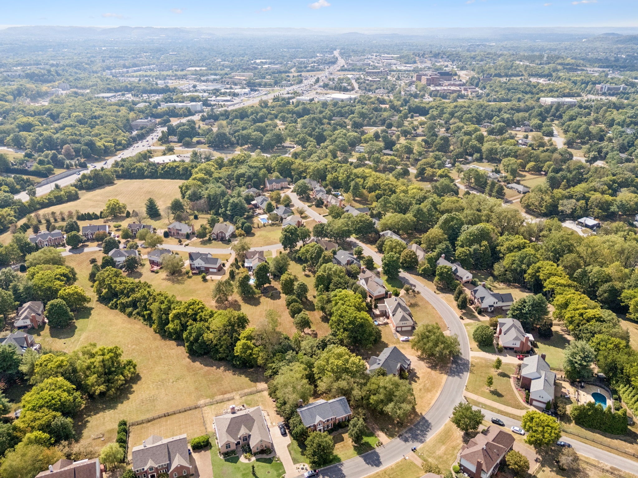 333 Springhouse Circle Franklin, TN 37067 - Photo 64 of 67 an aerial view of residential houses with outdoor space