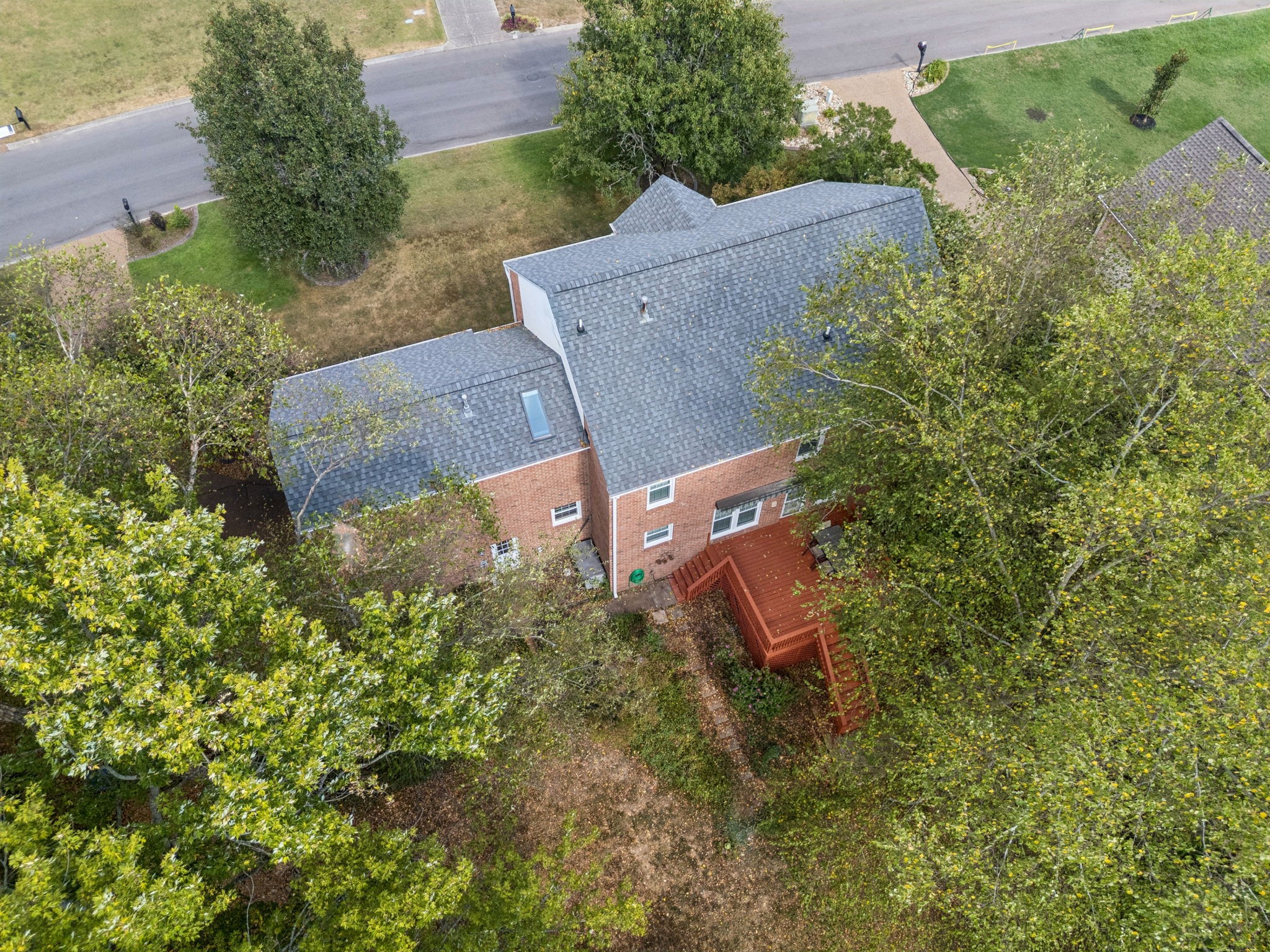 333 Springhouse Circle Franklin, TN 37067 - Photo 66 of 67 an aerial view of a house with a yard and trees