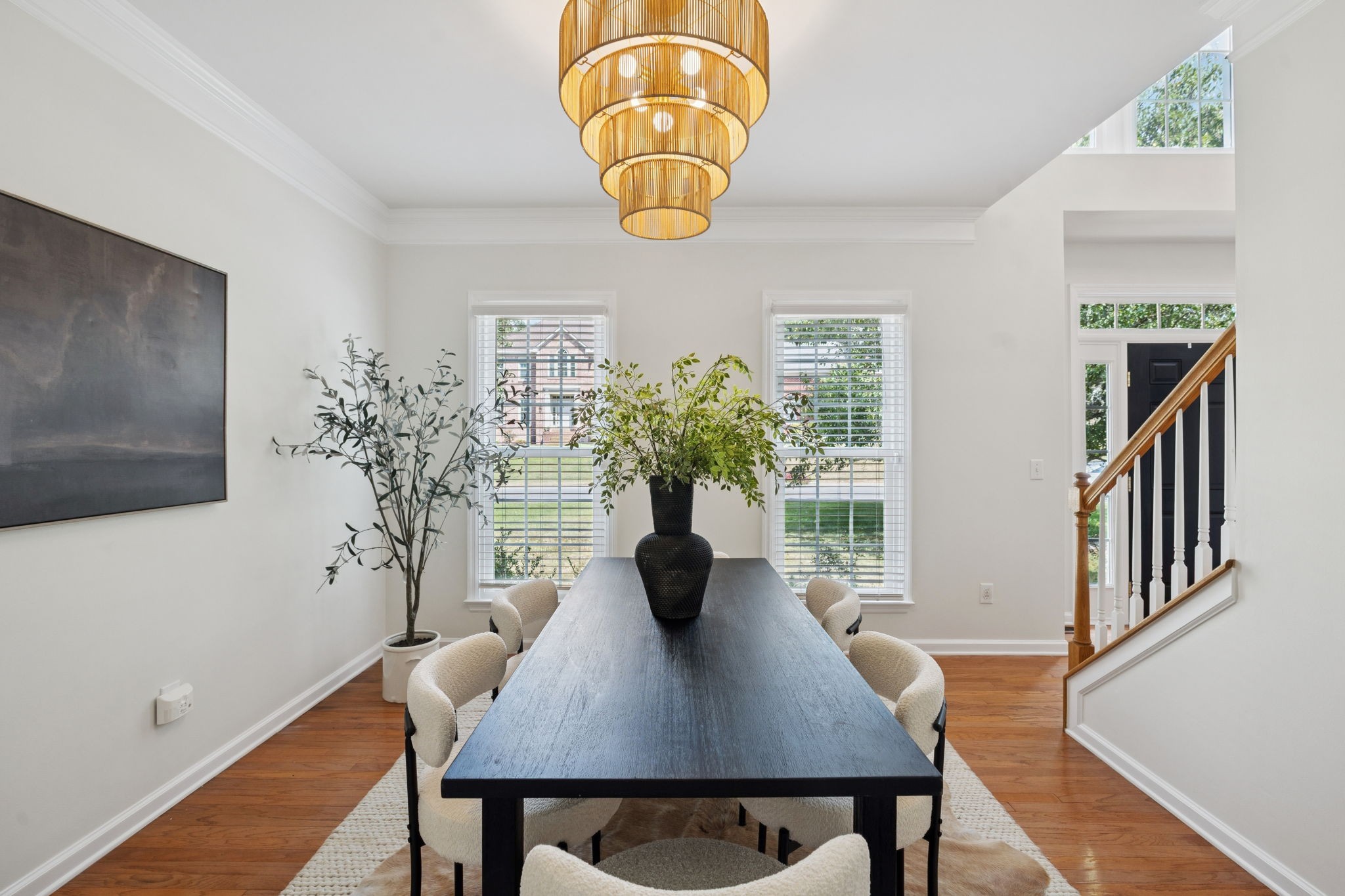 333 Springhouse Circle Franklin, TN 37067 - Photo 9 of 67 a view of a dining room with furniture and wooden floor
