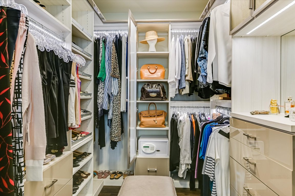 200 Congress Avenue, Unit 35AC Austin, TX 78701 - Photo 14 of 40 One of two primary suite closets, custom built by California Closets.