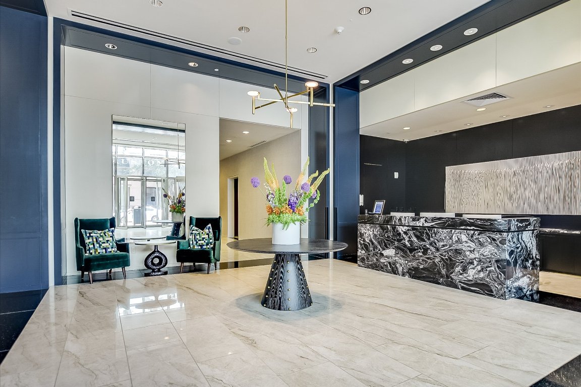 200 Congress Avenue, Unit 35AC Austin, TX 78701 - Photo 32 of 40 Reception area with 24-hour concierge & 24-hour security