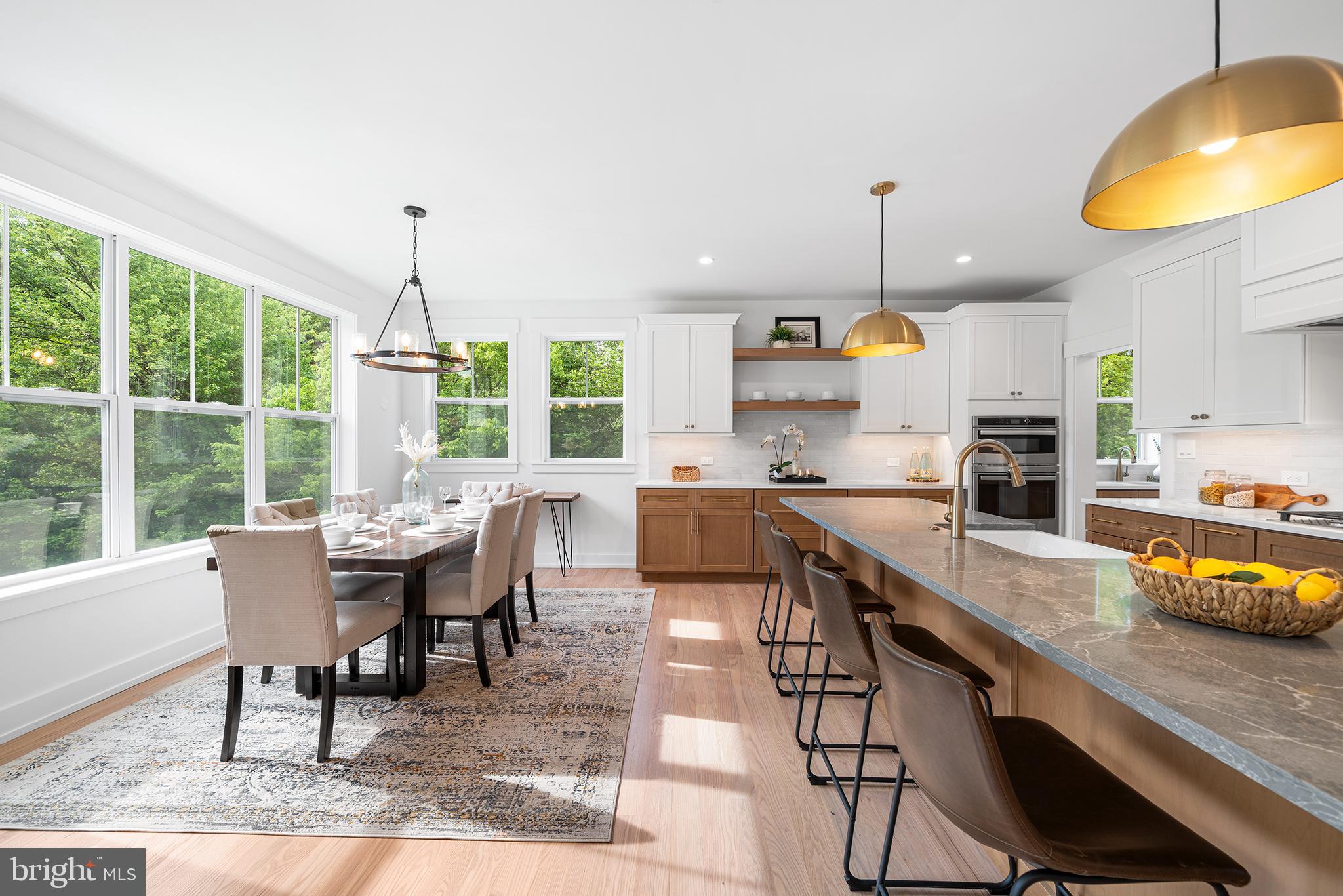 1815 Lot 1b Yost Road Blue Bell, PA 19422 - Photo 21 of 54 a kitchen with stainless steel appliances granite countertop a sink counter space and dining table