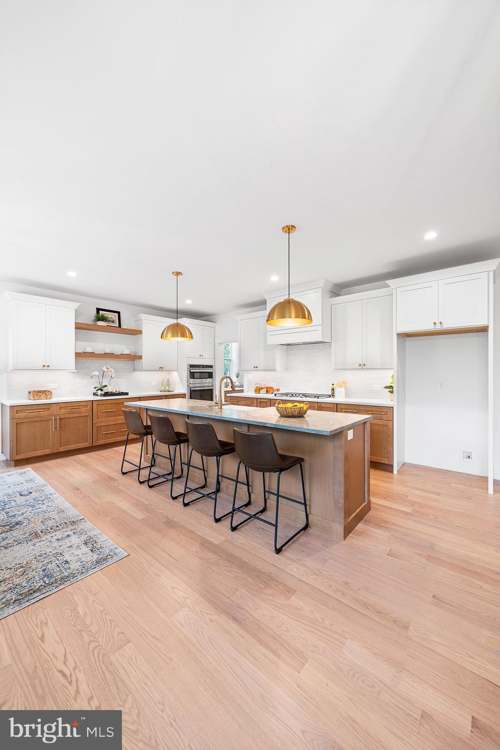 1815 Lot 1b Yost Road Blue Bell, PA 19422 - Photo 45 of 54 a view of a kitchen with kitchen island and stainless steel appliances