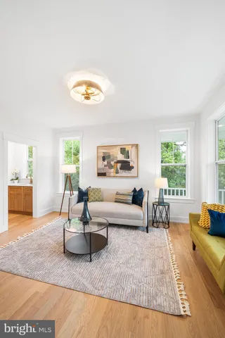 a bedroom with a large bed and a couch