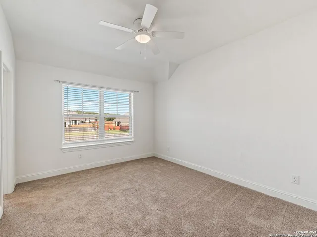 a view of a wooden roof deck