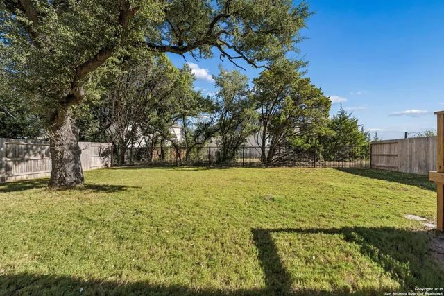 a view of swimming pool with an outdoor seating