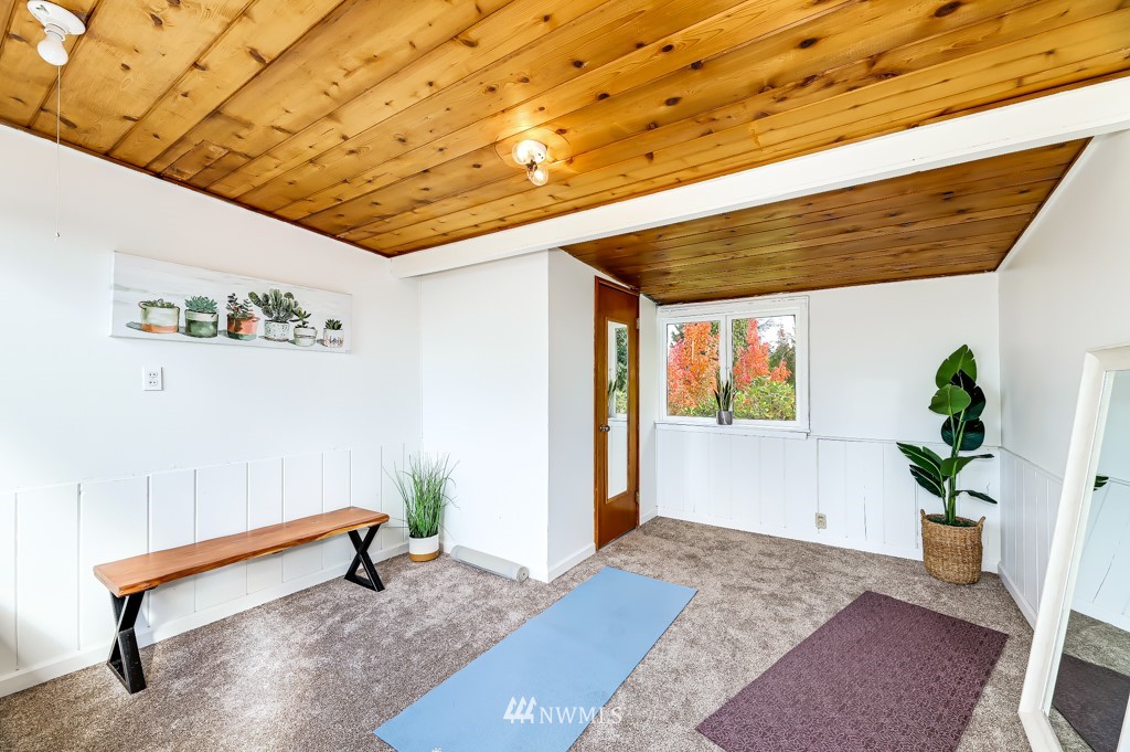 3605 Evergreen Point Road Medina, WA 98039 - Photo 25 of 25 a living room with hardwood floor and a balcony