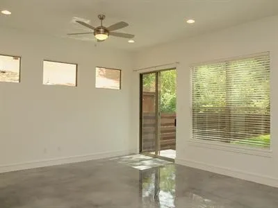 a view of an empty room with a window