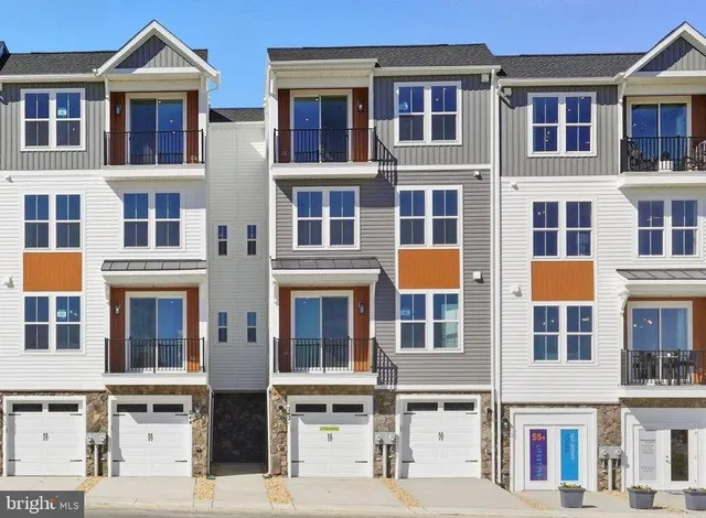 a front view of a building with glass windows