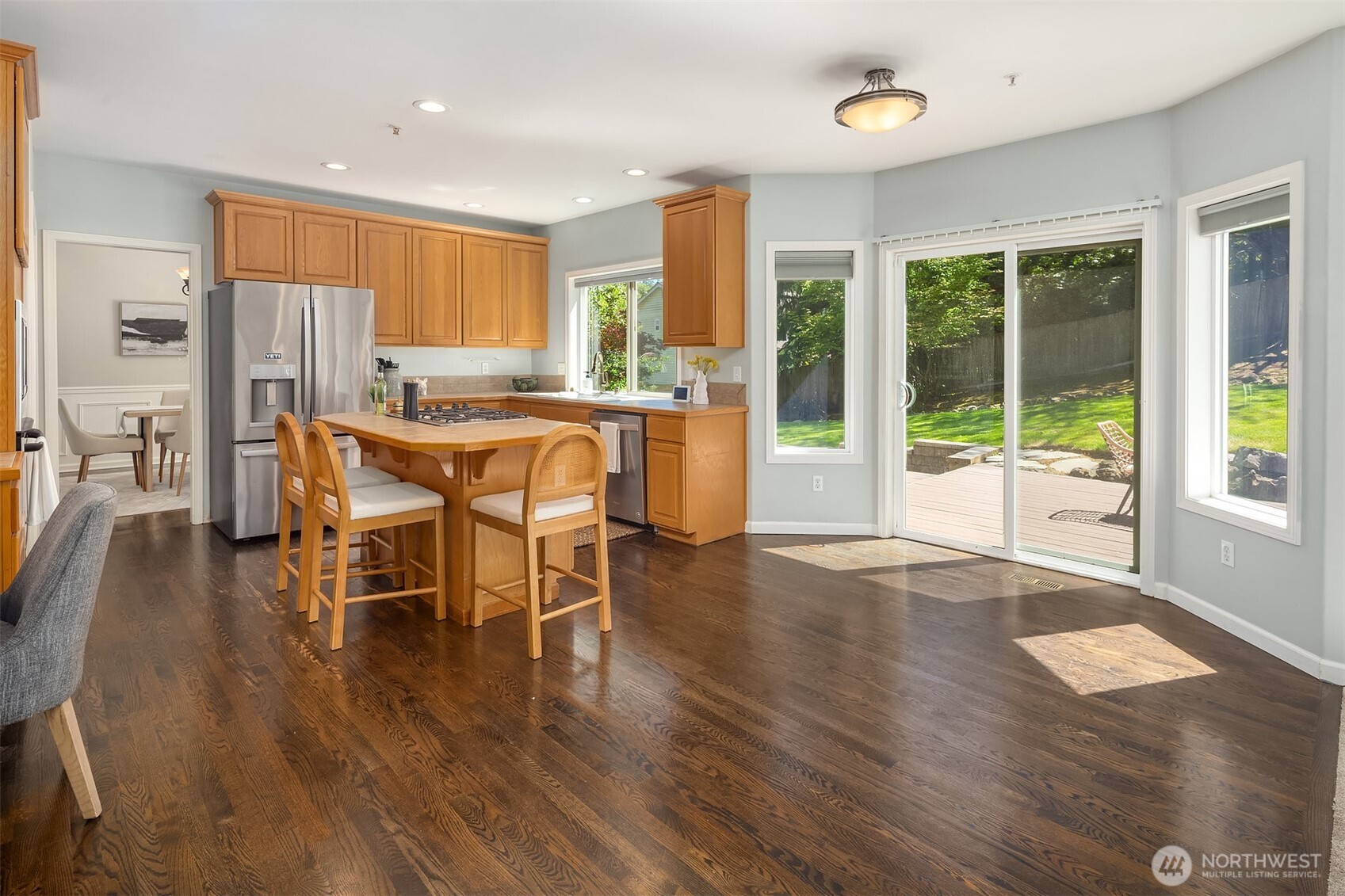 328 210 Street Southeast Bothell, WA 98021 - Photo 9 of 38 a dining room with furniture window wooden floor