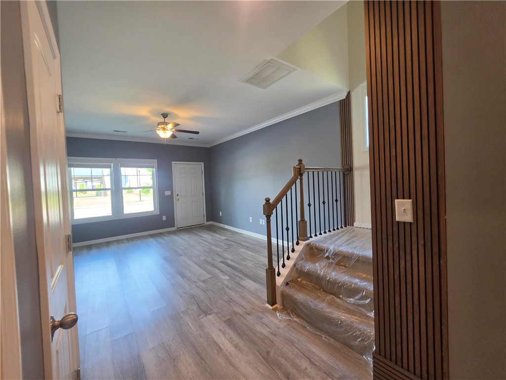 312 Phillips Drive Pendleton, SC 29670 - Photo 9 of 45 This inviting space features durable flooring and a bright entryway, perfect for welcoming guests.