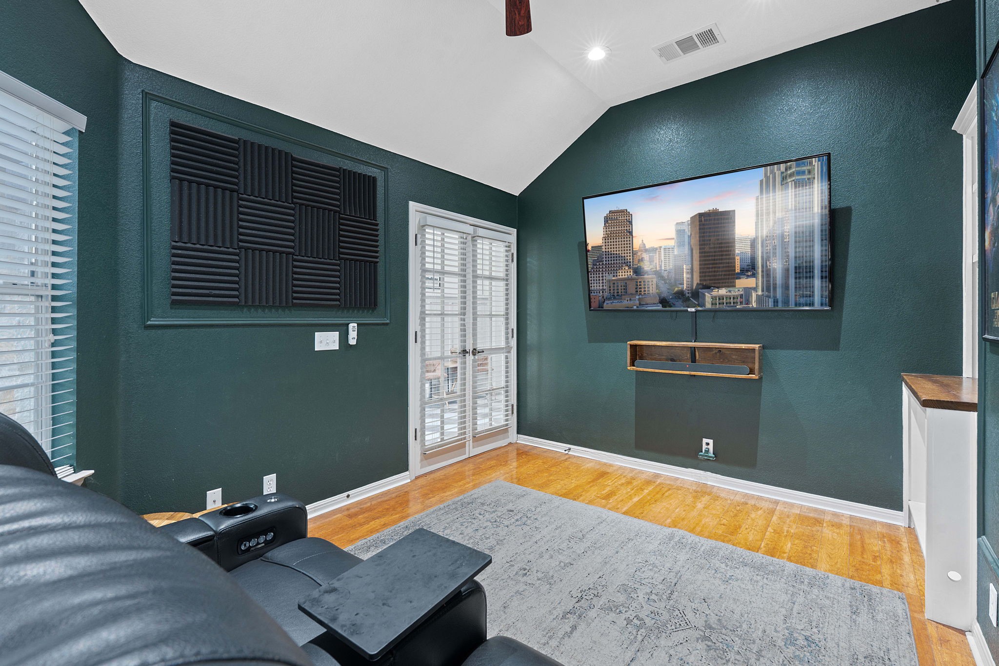 150 Manchester Lane Austin, TX 78737 - Photo 22 of 24 a room with window and wooden floor