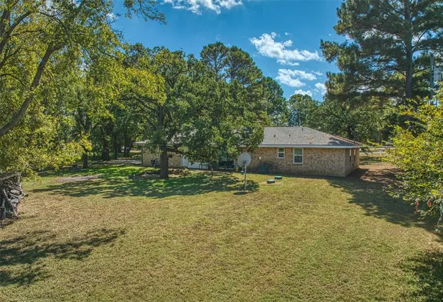 a house view with a garden space