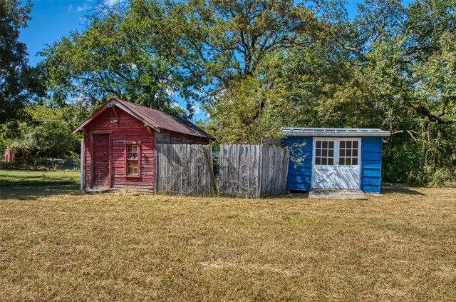 a view of a house with a garden