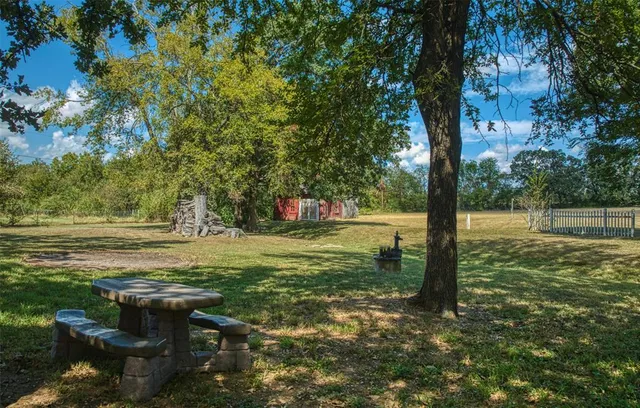 a house with trees in front of it