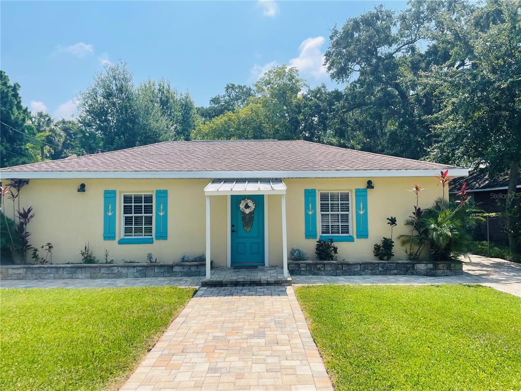 7808 Davis Street Port Richey, FL 34668 - Photo 1 of 1 a front view of house with swimming pool and porch