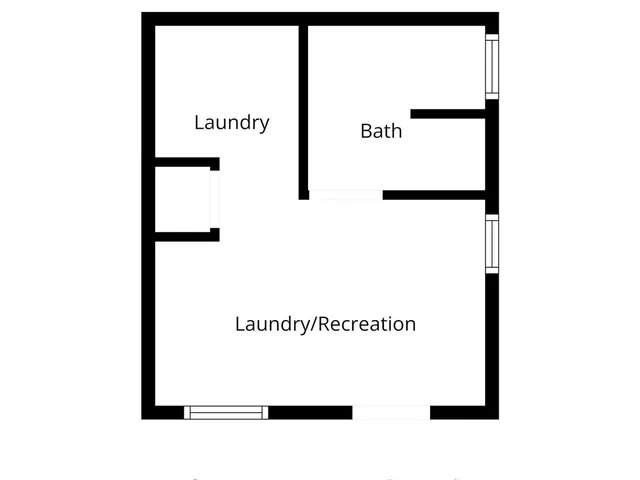 a view of a yard with wooden fence