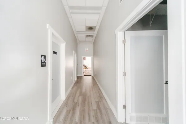 a room with a bed and a chair