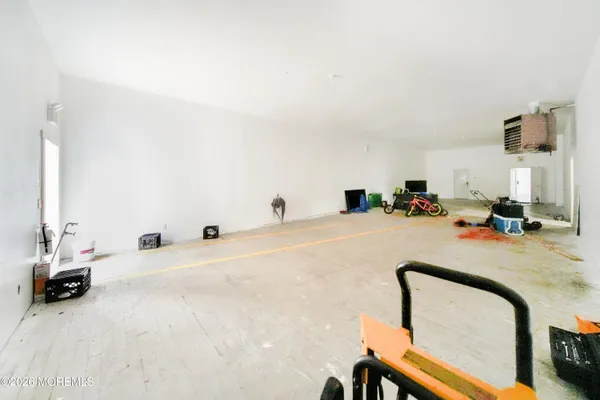 a view of a living room and a garage