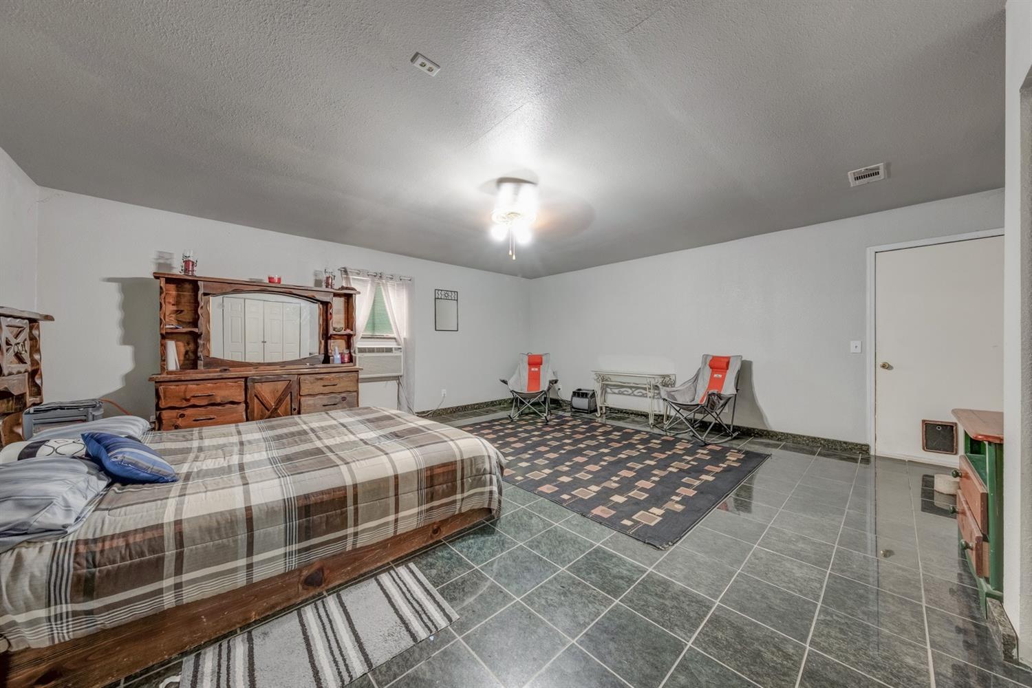 17609 Rodeo Drive Madera, CA 93638 - Photo 14 of 31 4th bedroom, game room, or family room, the possiblities are endless!
