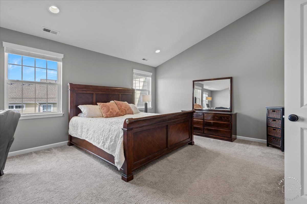 1261 Falcon Ridge Drive Elgin, IL 60124 - Photo 14 of 25 a bed room with a bed and a chair