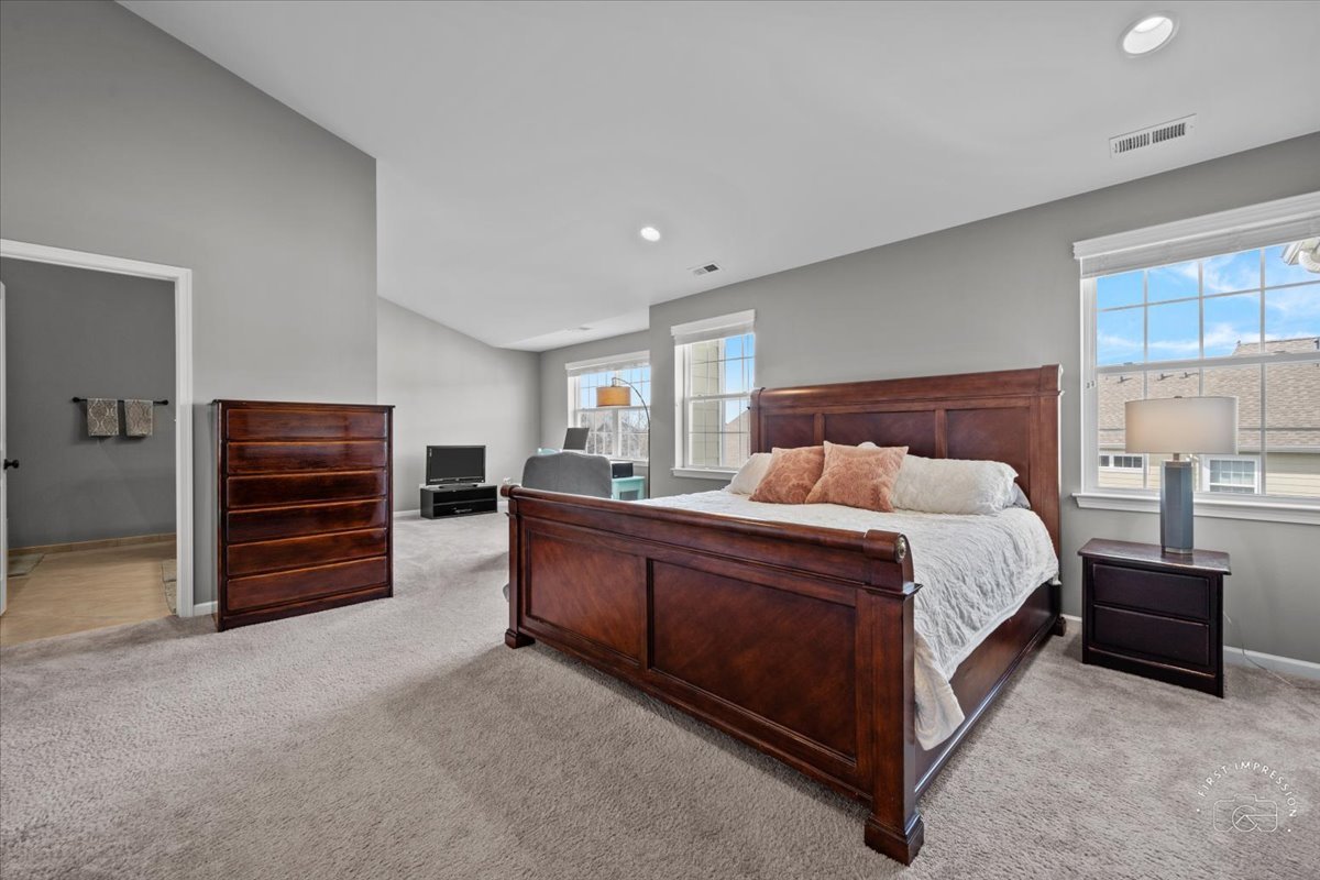 1261 Falcon Ridge Drive Elgin, IL 60124 - Photo 15 of 25 a bed room with a bed and furniture