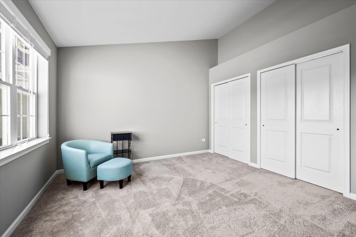 1261 Falcon Ridge Drive Elgin, IL 60124 - Photo 20 of 25 a living room with furniture and a window