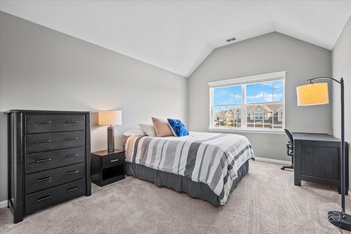 1261 Falcon Ridge Drive Elgin, IL 60124 - Photo 21 of 25 a bedroom with a bed and with furniture