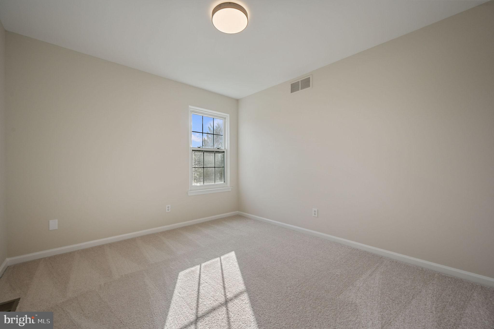 63 Raphael Road Smyrna, DE 19977 - Photo 17 of 27 a view of room and window